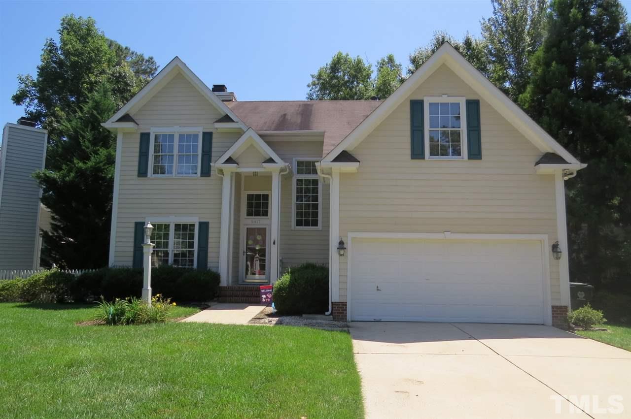 5417 Ingate Way Raleigh, NC 27613 - Photo 1 of 16 a front view of a house with a yard