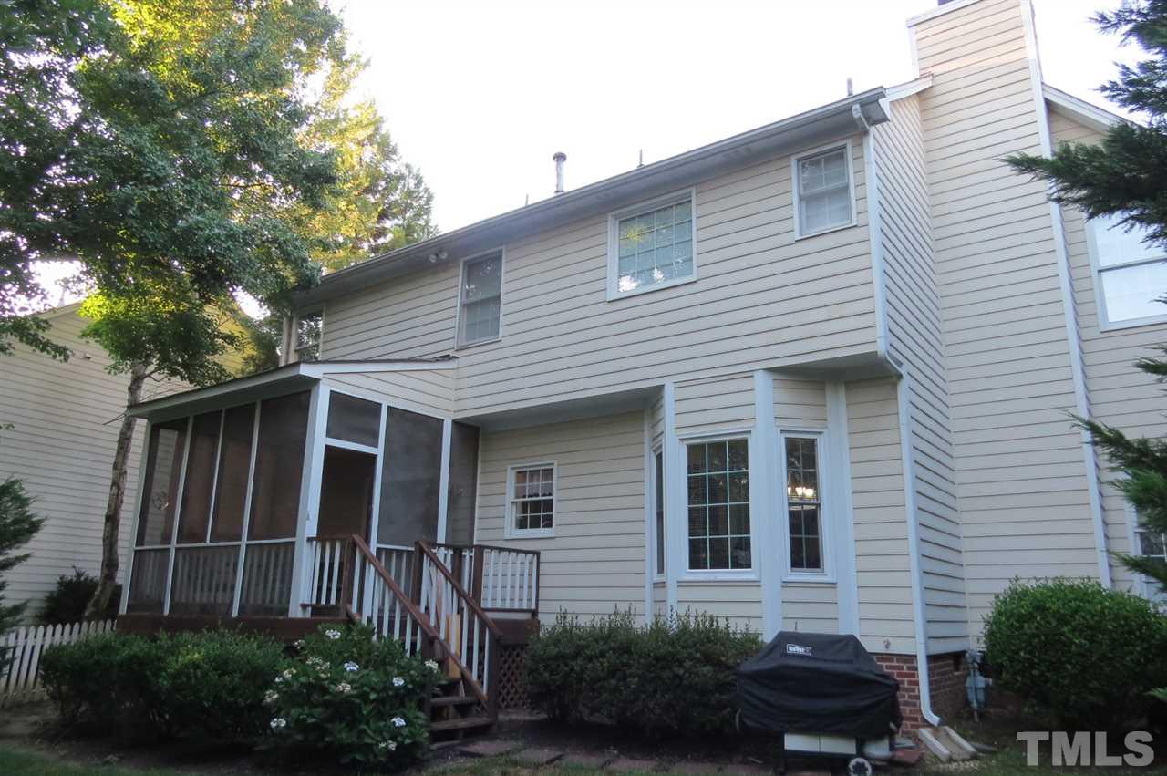 5417 Ingate Way Raleigh, NC 27613 - Photo 2 of 16 a view of a house with a yard