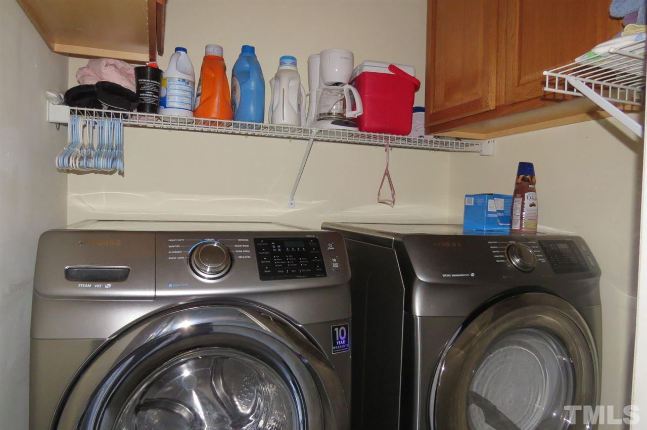 5417 Ingate Way Raleigh, NC 27613 - Photo 14 of 16 a utility room with dryer and washer