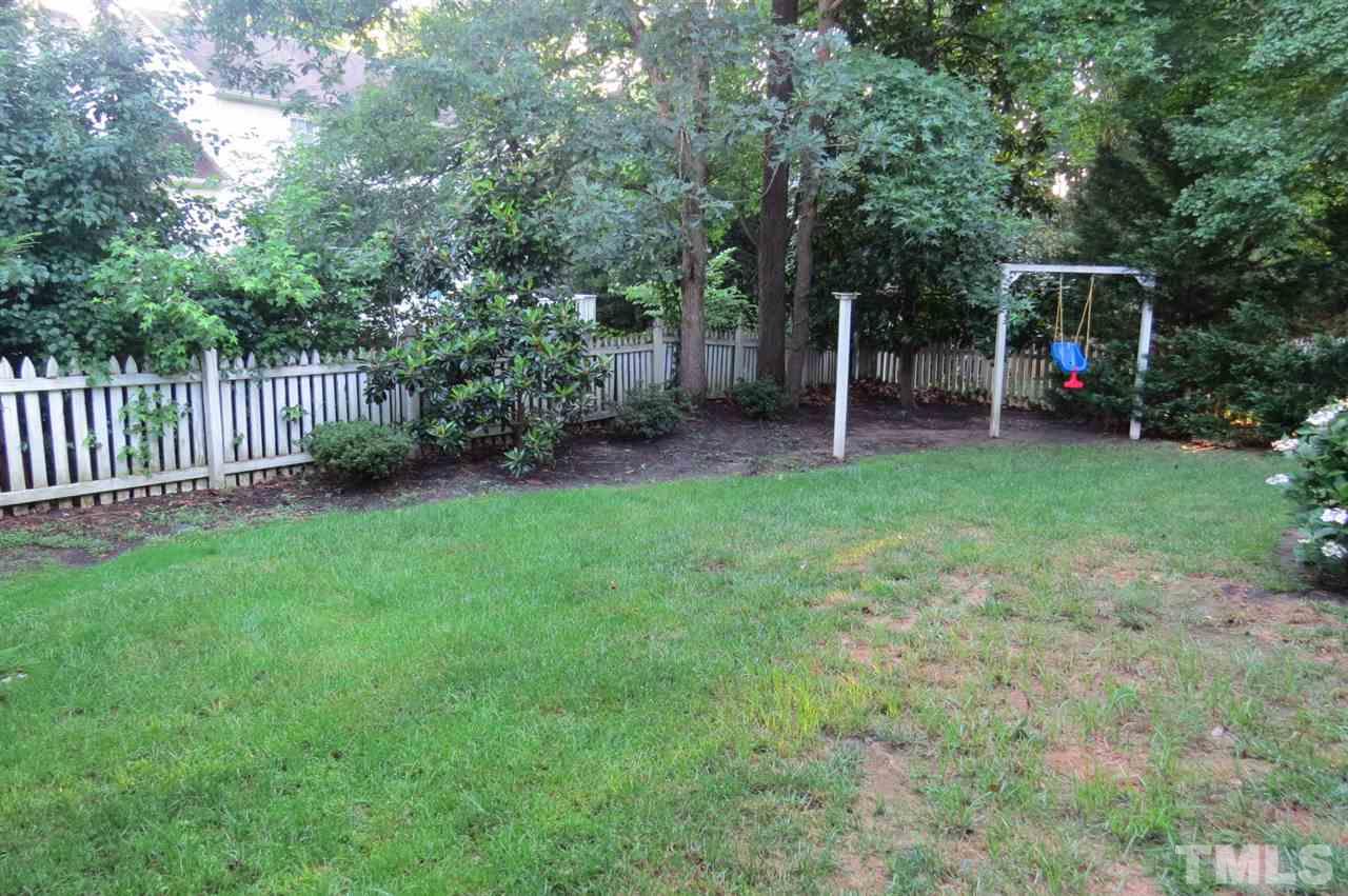 5417 Ingate Way Raleigh, NC 27613 - Photo 16 of 16 a view of a chair and table in the yard
