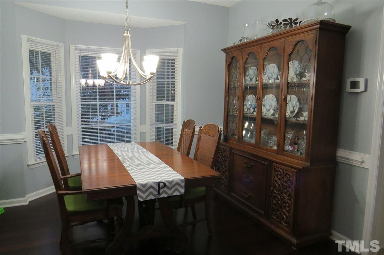 5417 Ingate Way Raleigh, NC 27613 - Photo 5 of 16 a view of a dining room with furniture window and outside view
