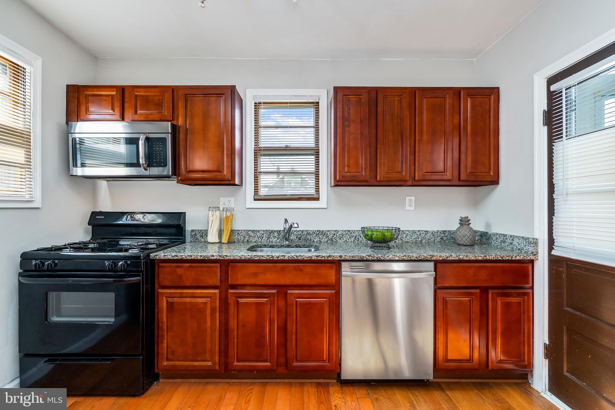 1810 Kinship Road Dundalk, MD 21222 - Photo 12 of 28 Stunning Granite Counters &Gorgeous Cabinetry