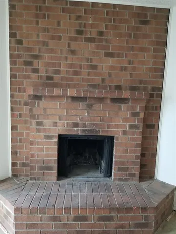 a living room with a fireplace