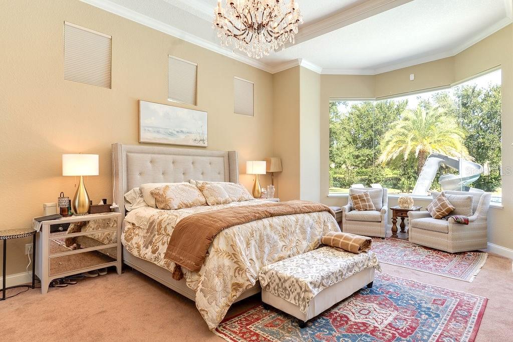 13448 Bellaria Circle Windermere, FL 34786 - Photo 19 of 66 a bedroom with a bed and a couch