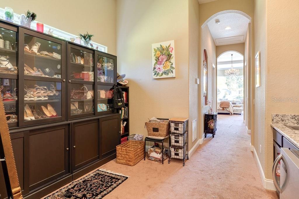 13448 Bellaria Circle Windermere, FL 34786 - Photo 23 of 66 a view of a hallway with workspace and windows