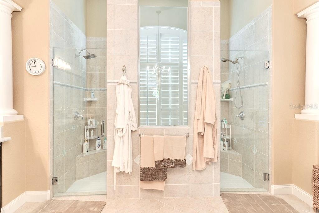 13448 Bellaria Circle Windermere, FL 34786 - Photo 27 of 66 a bathroom with a bathtub and a shower