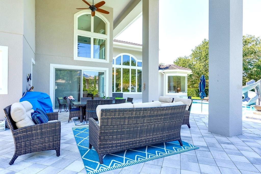 13448 Bellaria Circle Windermere, FL 34786 - Photo 40 of 65 a view of an outdoor sitting area with furniture