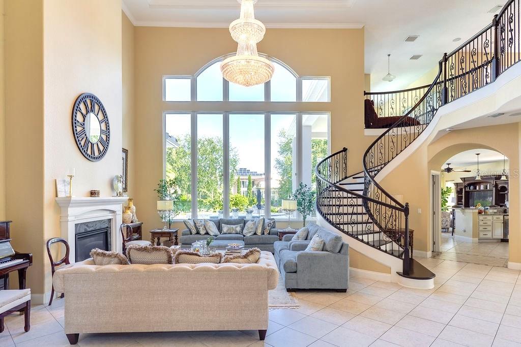13448 Bellaria Circle Windermere, FL 34786 - Photo 4 of 66 a living room with furniture and a large window