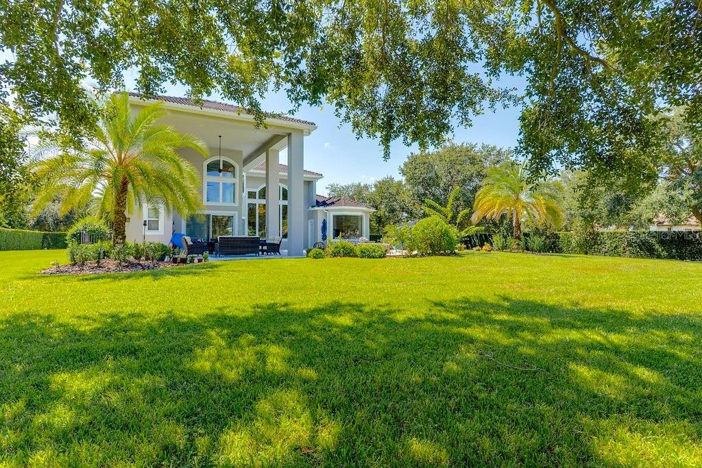13448 Bellaria Circle Windermere, FL 34786 - Photo 45 of 65 a front view of house with yard and green space