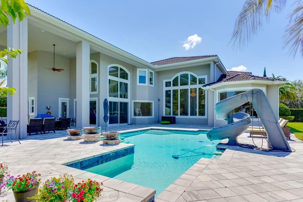 13448 Bellaria Circle Windermere, FL 34786 - Photo 47 of 65 a view of an house with outdoor seating space