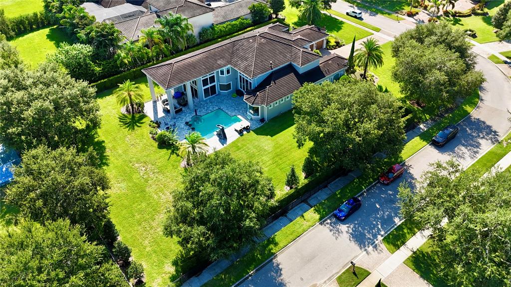 13448 Bellaria Circle Windermere, FL 34786 - Photo 64 of 66 an aerial view of a house with a yard