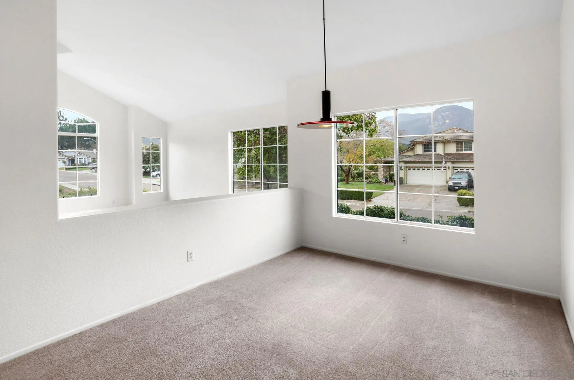 8472 Mesa Heights Road Santee, CA 92071 - Photo 11 of 34 a view of an empty room with windows
