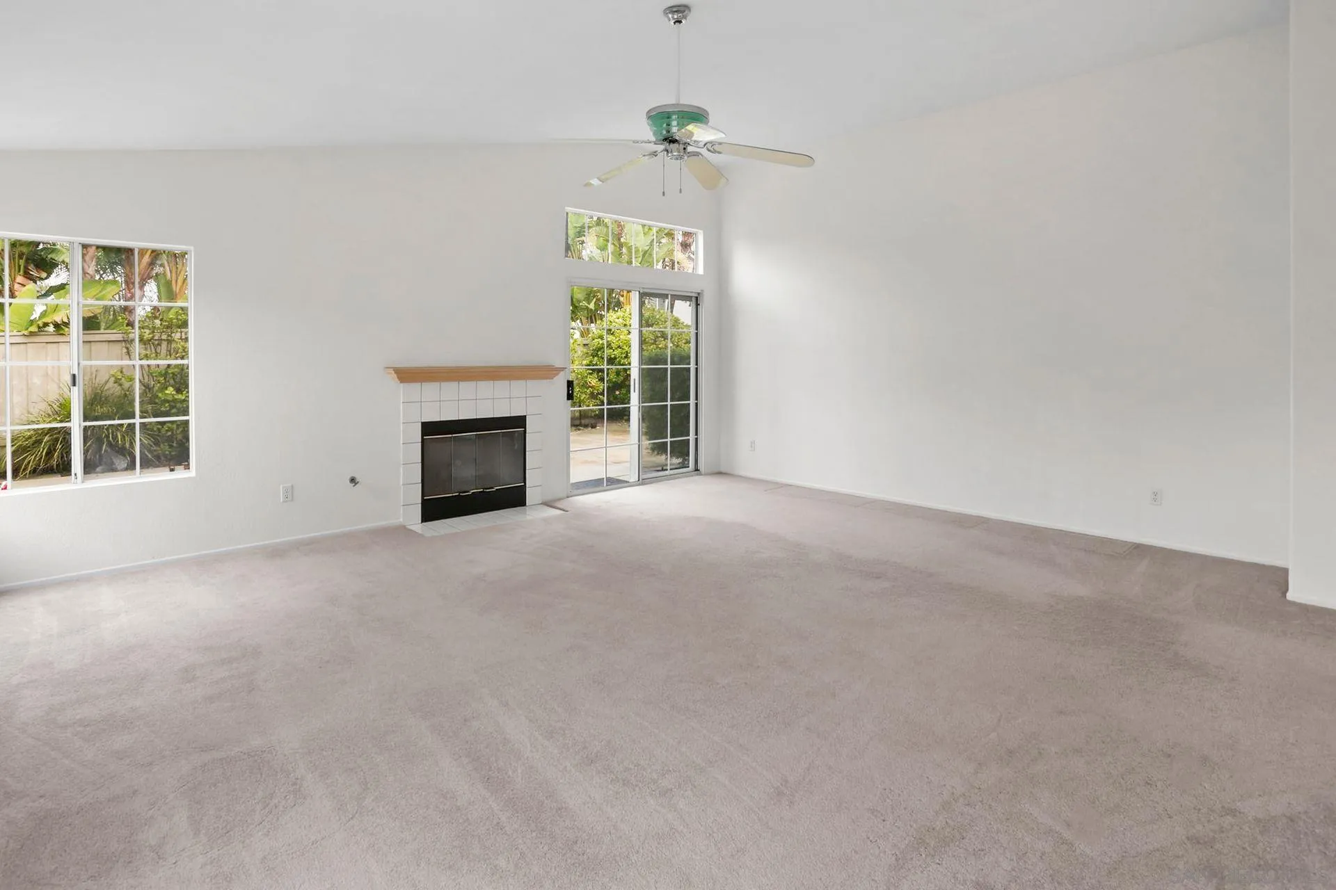 8472 Mesa Heights Road Santee, CA 92071 - Photo 13 of 34 an empty room with a window and fireplace
