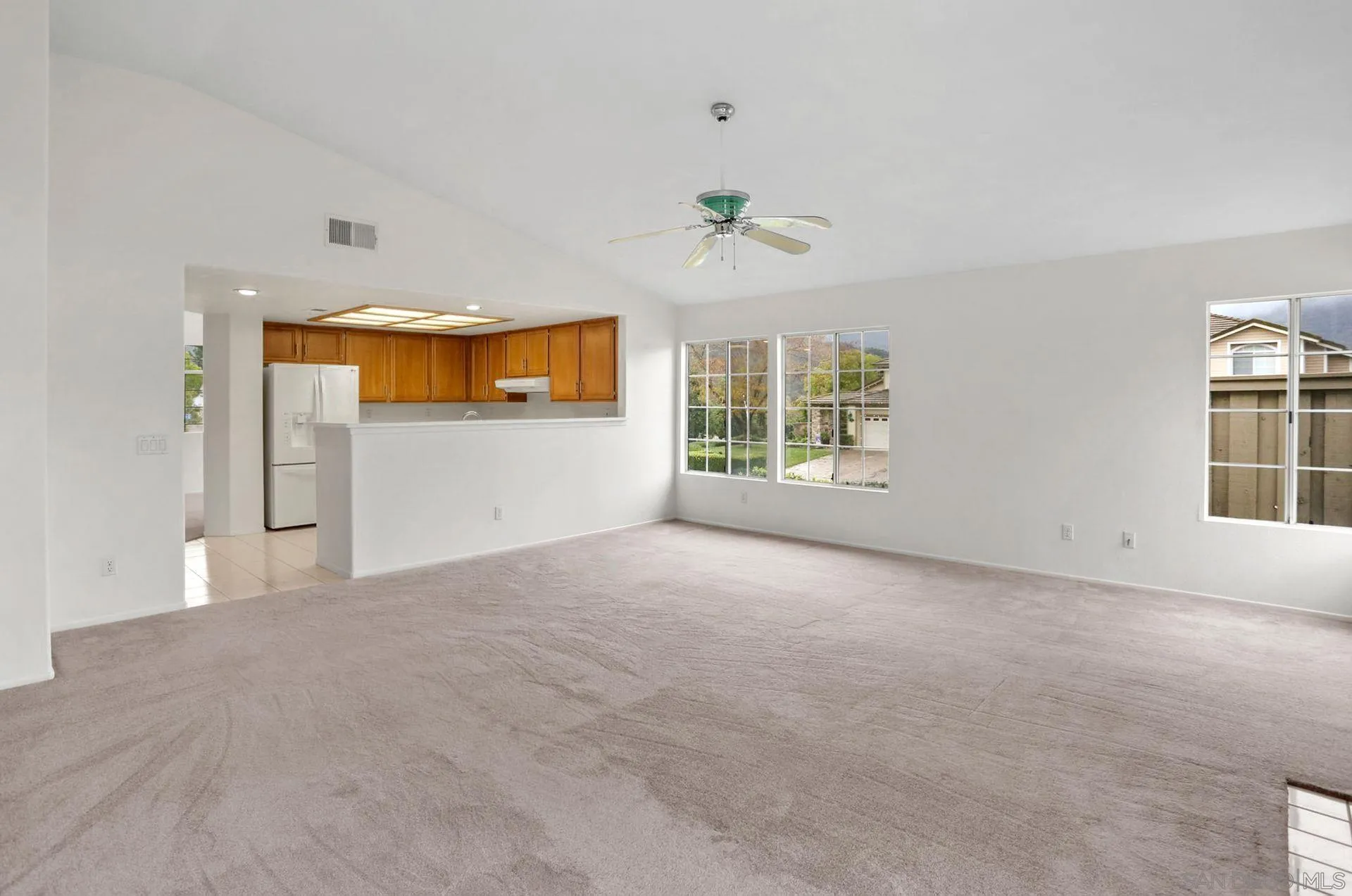8472 Mesa Heights Road Santee, CA 92071 - Photo 15 of 34 a view of an empty room with a window