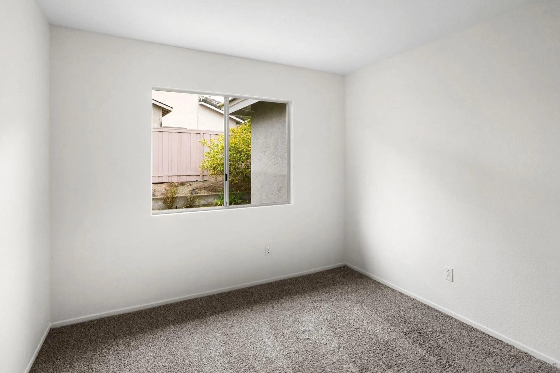 8472 Mesa Heights Road Santee, CA 92071 - Photo 16 of 34 an empty room with a window