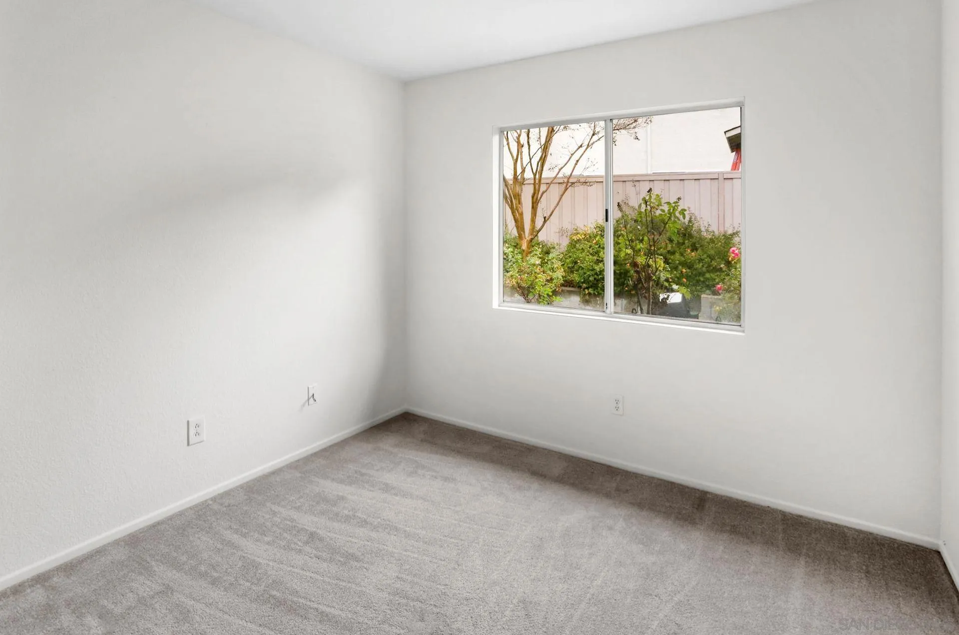 8472 Mesa Heights Road Santee, CA 92071 - Photo 19 of 34 an empty room with a window