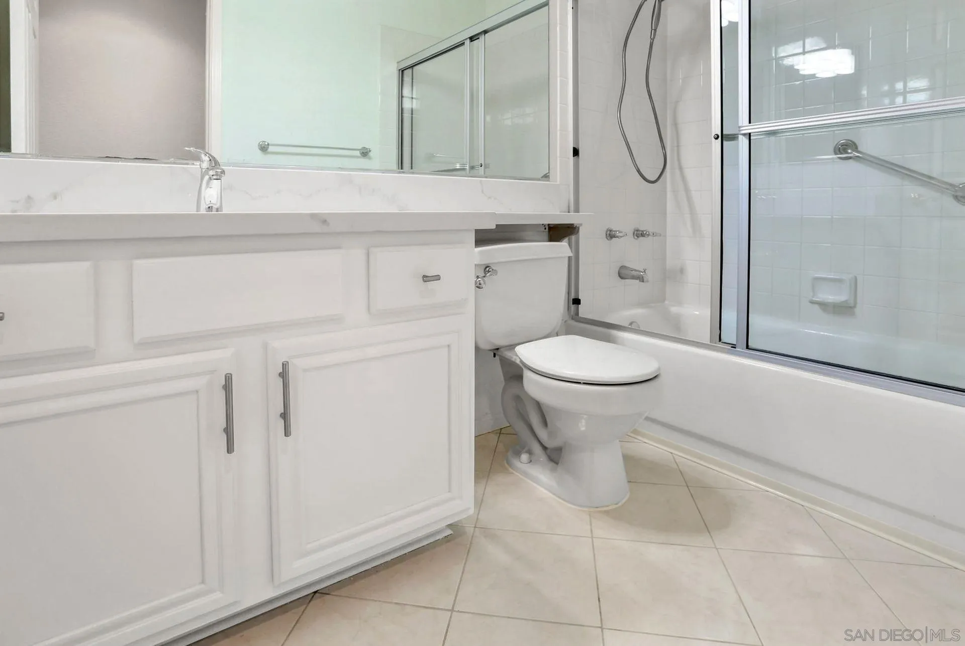 8472 Mesa Heights Road Santee, CA 92071 - Photo 21 of 34 a bathroom with a sink toilet and shower