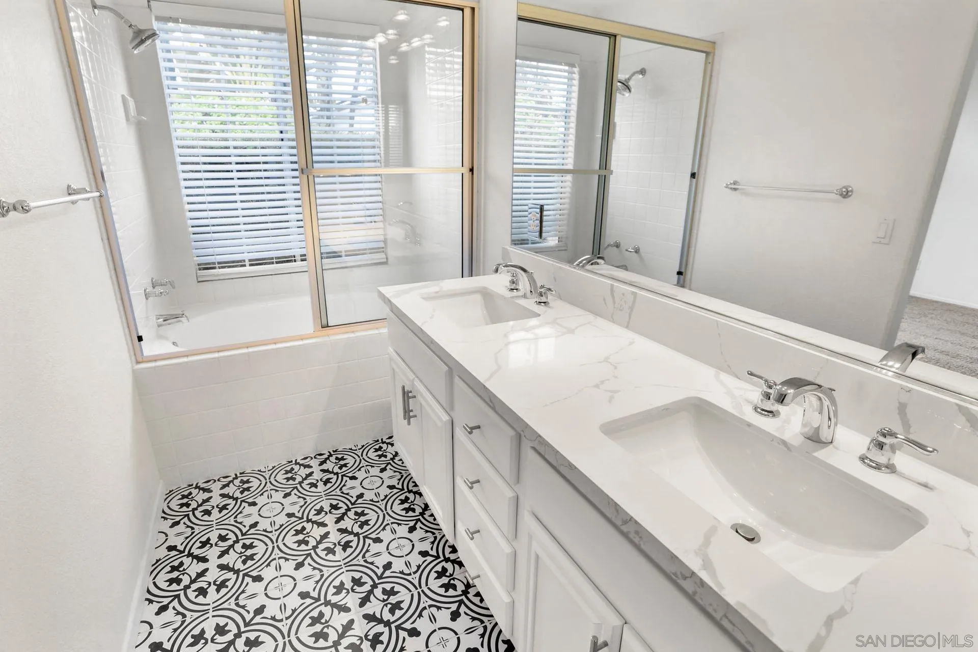 8472 Mesa Heights Road Santee, CA 92071 - Photo 25 of 34 a bathroom with a sink and a bathtub
