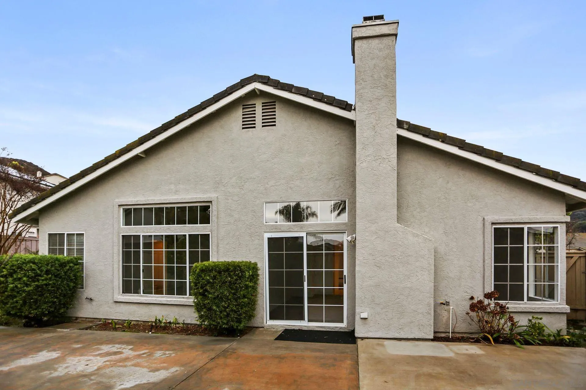 8472 Mesa Heights Road Santee, CA 92071 - Photo 26 of 34 a front view of a house with a yard