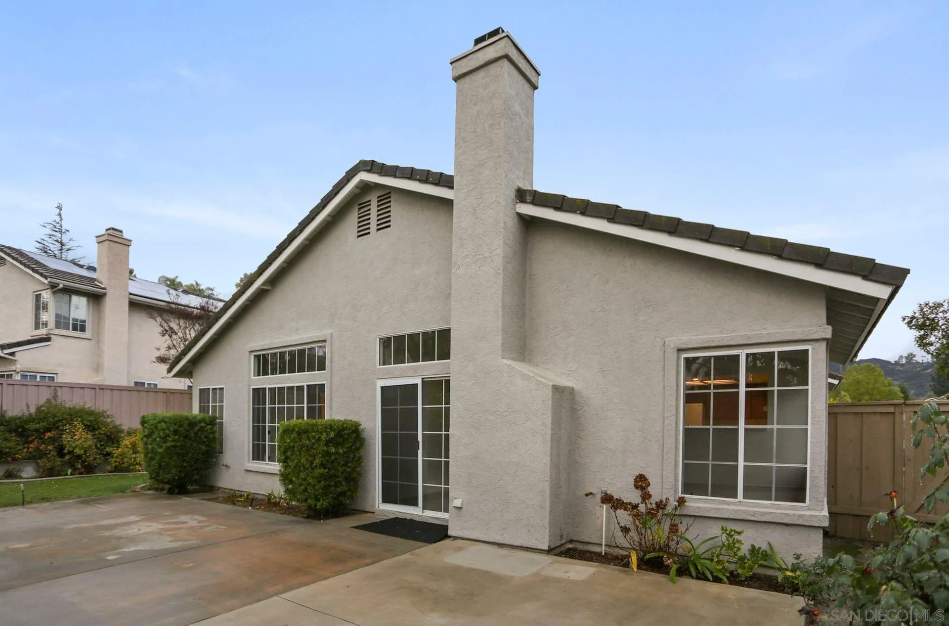 8472 Mesa Heights Road Santee, CA 92071 - Photo 27 of 34 a front view of a house with a yard