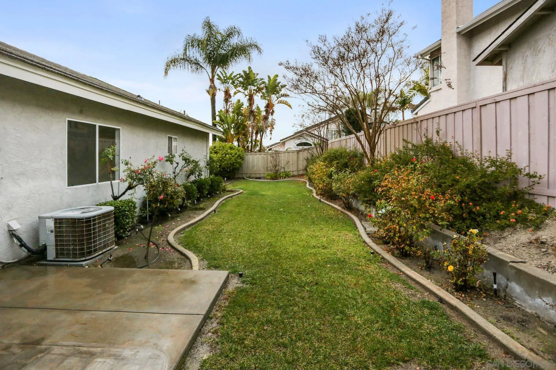 8472 Mesa Heights Road Santee, CA 92071 - Photo 32 of 34 a backyard of a house with lots of green space
