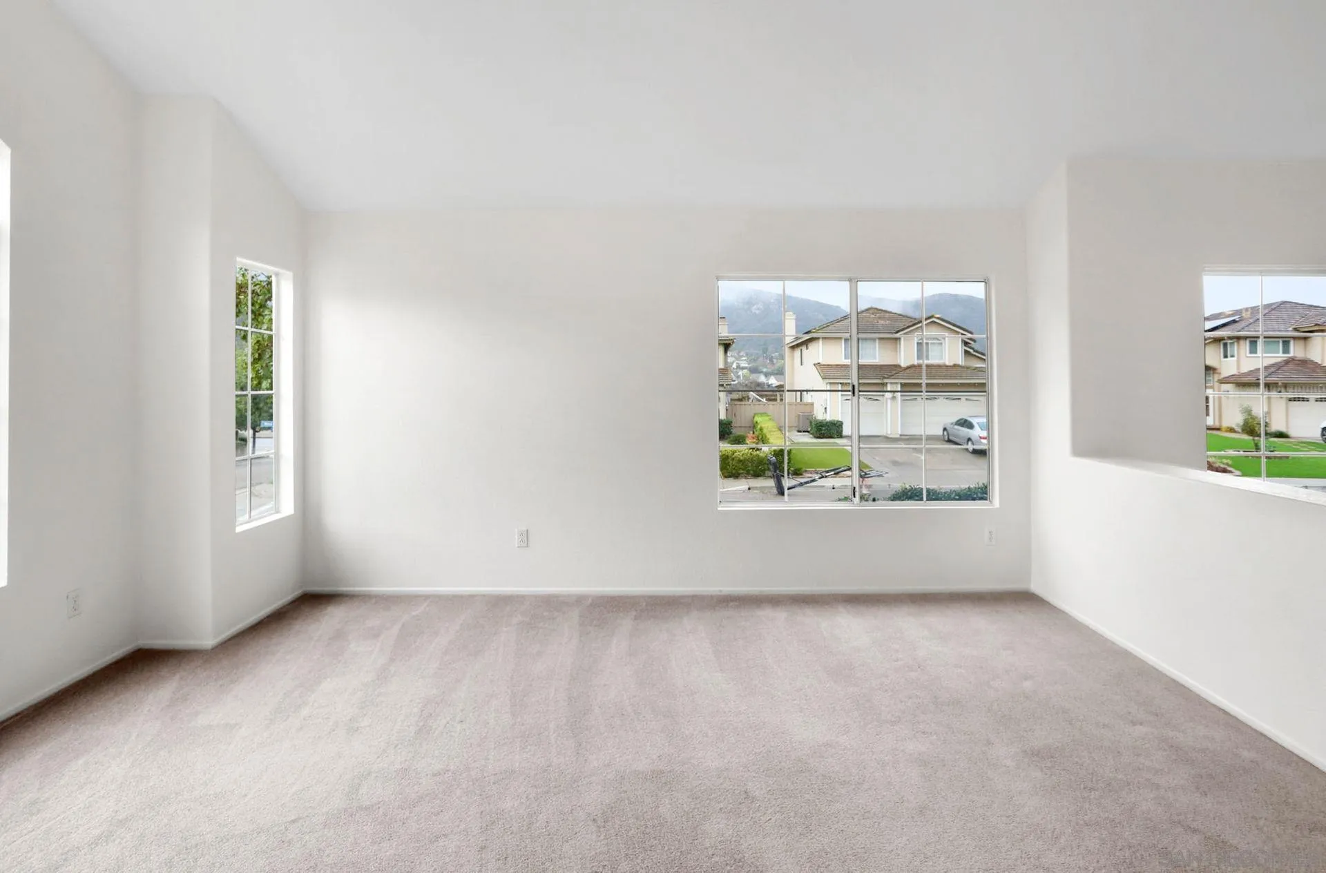 8472 Mesa Heights Road Santee, CA 92071 - Photo 7 of 34 an empty room with windows