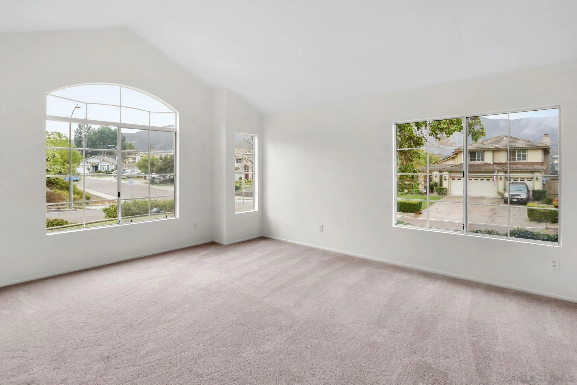 8472 Mesa Heights Road Santee, CA 92071 - Photo 8 of 34 an empty room with a window