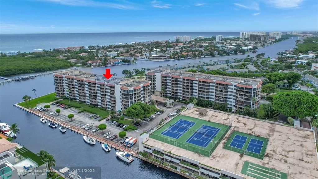 899 Jeffery Street, Unit 109 Boca Raton, FL 33487 - Photo 34 of 37 an aerial view of a city with houses