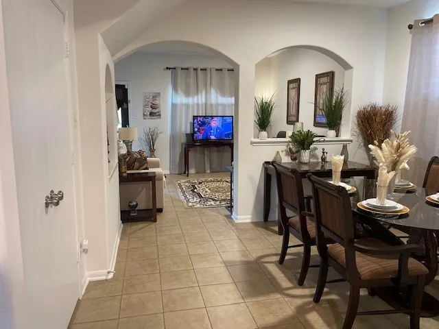 a view of living room and kitchen with furniture