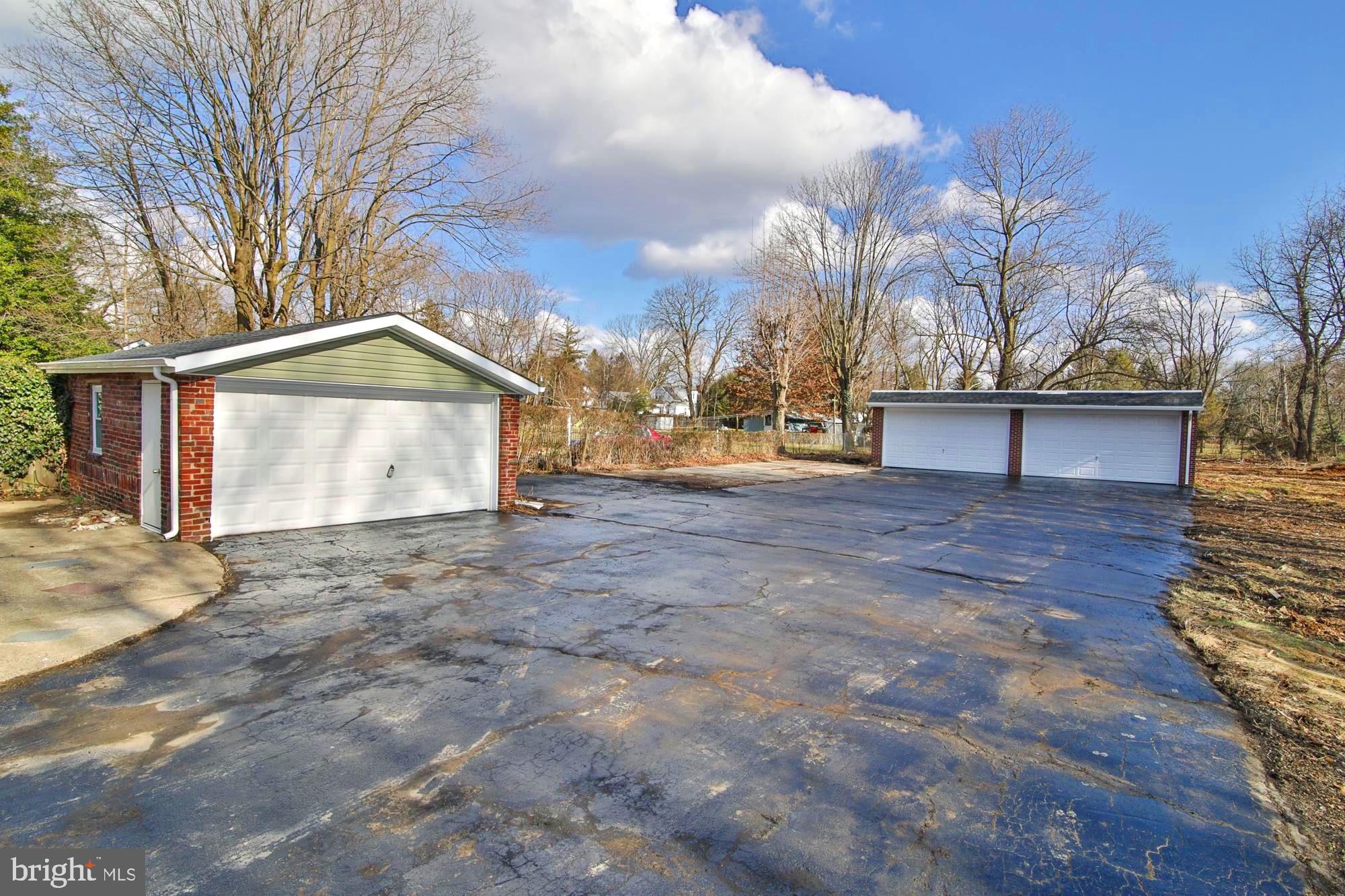 2374 Pennington Road Pennington, NJ 08534 - Photo 37 of 41 Total of 6 car garages. 20 + car driveway