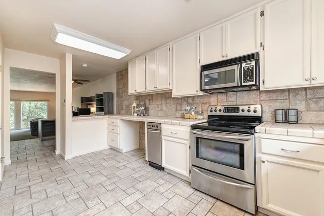 a bedroom with a bed and a walk in closet