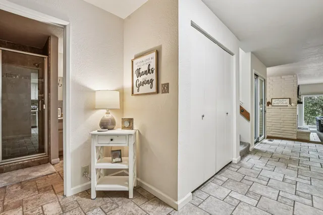 a bedroom with a bed and a couch