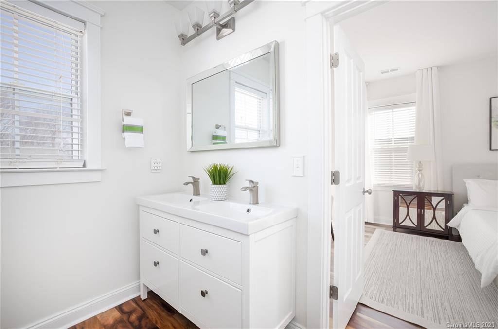 16518 Knox Run Road Huntersville, NC 28078 - Photo 22 of 32 a bathroom with a sink and a mirror