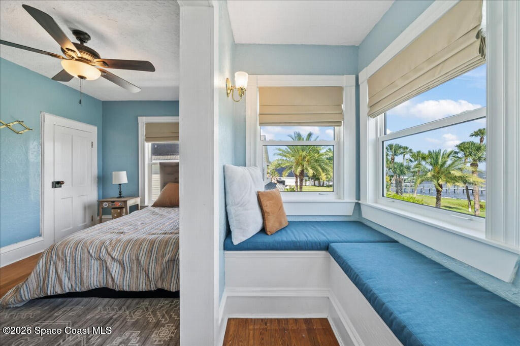1110 Riverside Drive Titusville, FL 32780 - Photo 24 of 50 a bedroom with a bed and a window