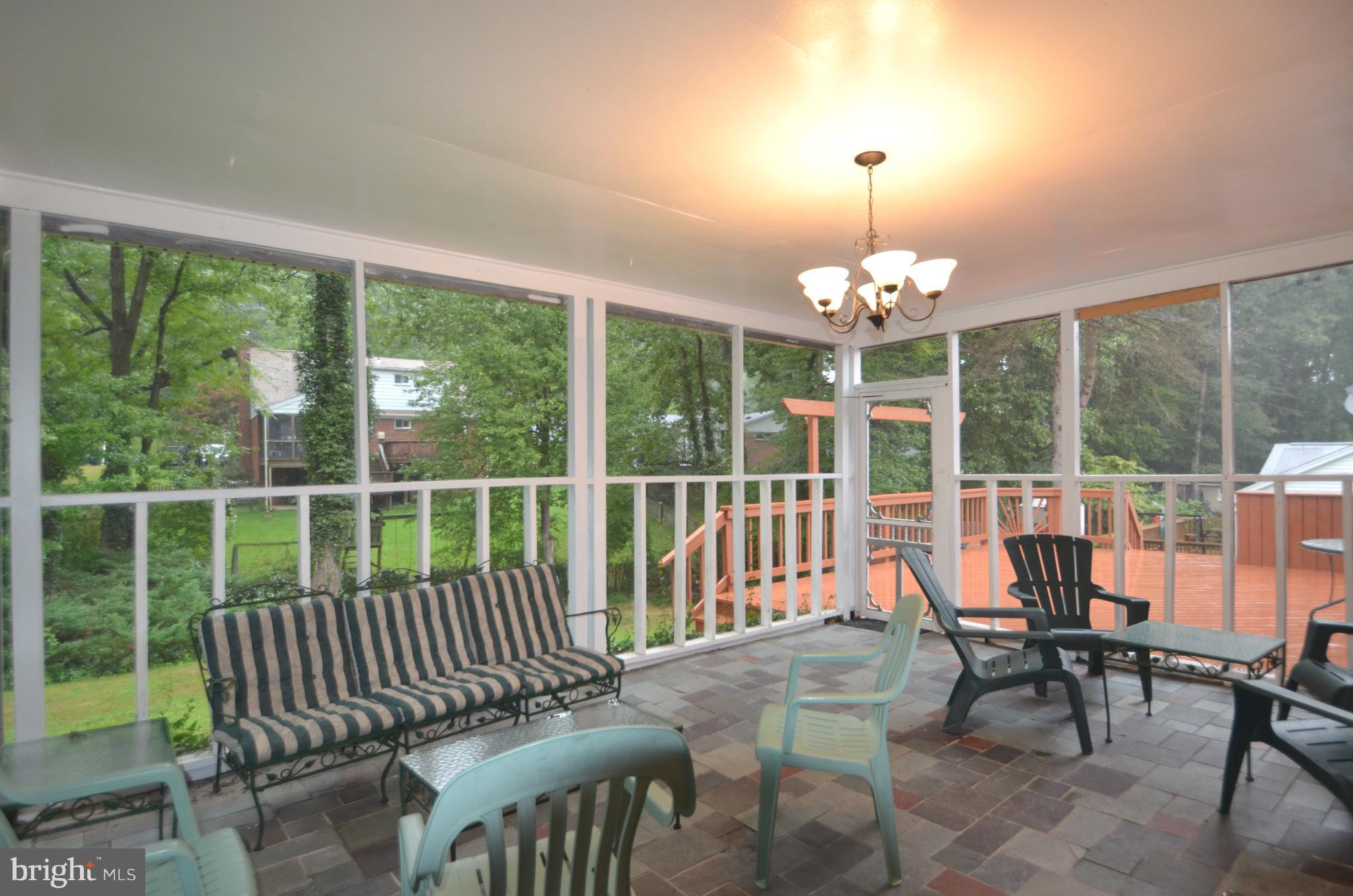 8627 Victoria Road Springfield, VA 22151 - Photo 26 of 30 a view of a dining room with furniture window and outside view