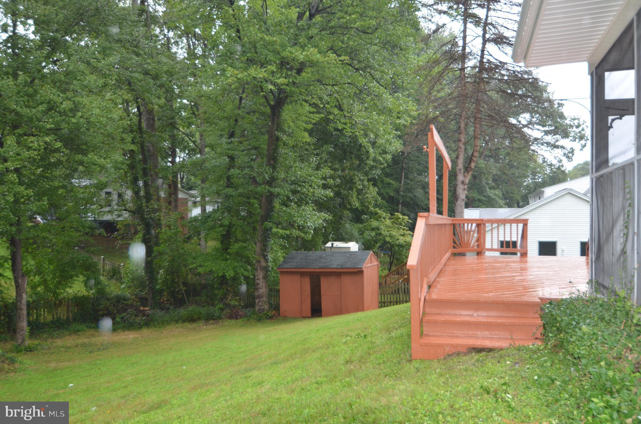 8627 Victoria Road Springfield, VA 22151 - Photo 28 of 30 front view of a house with a yard