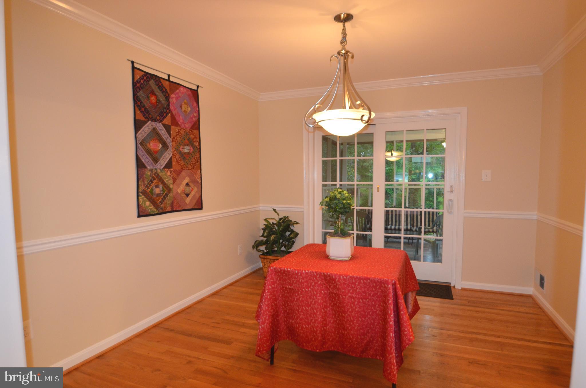 8627 Victoria Road Springfield, VA 22151 - Photo 6 of 30 a bedroom with a bed and a window