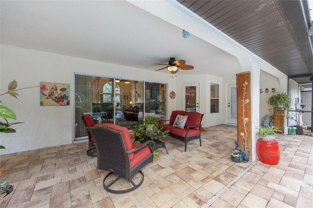 18825 Southwest 93rd Loop Dunnellon, FL 34432 - Photo 54 of 85 a living room with furniture a rug and a large window