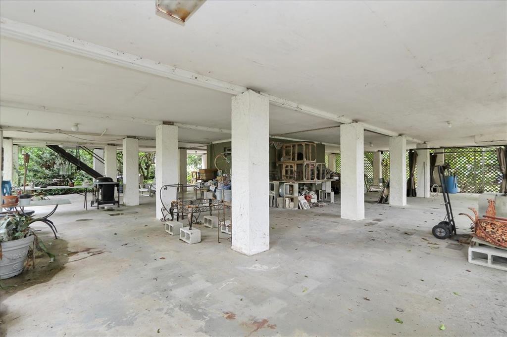 35 Magnolia Avenue Yankeetown, FL 34498 - Photo 11 of 75 a view of a livingroom with furniture and windows
