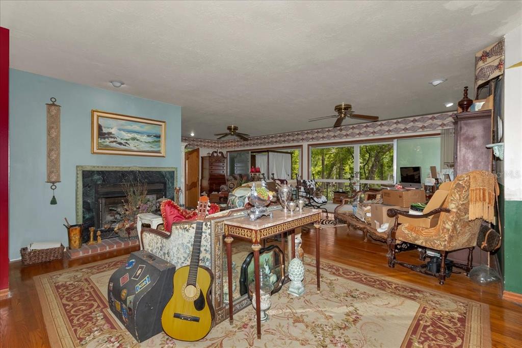 35 Magnolia Avenue Yankeetown, FL 34498 - Photo 20 of 75 a view of a dining room with furniture a rug and wooden floor