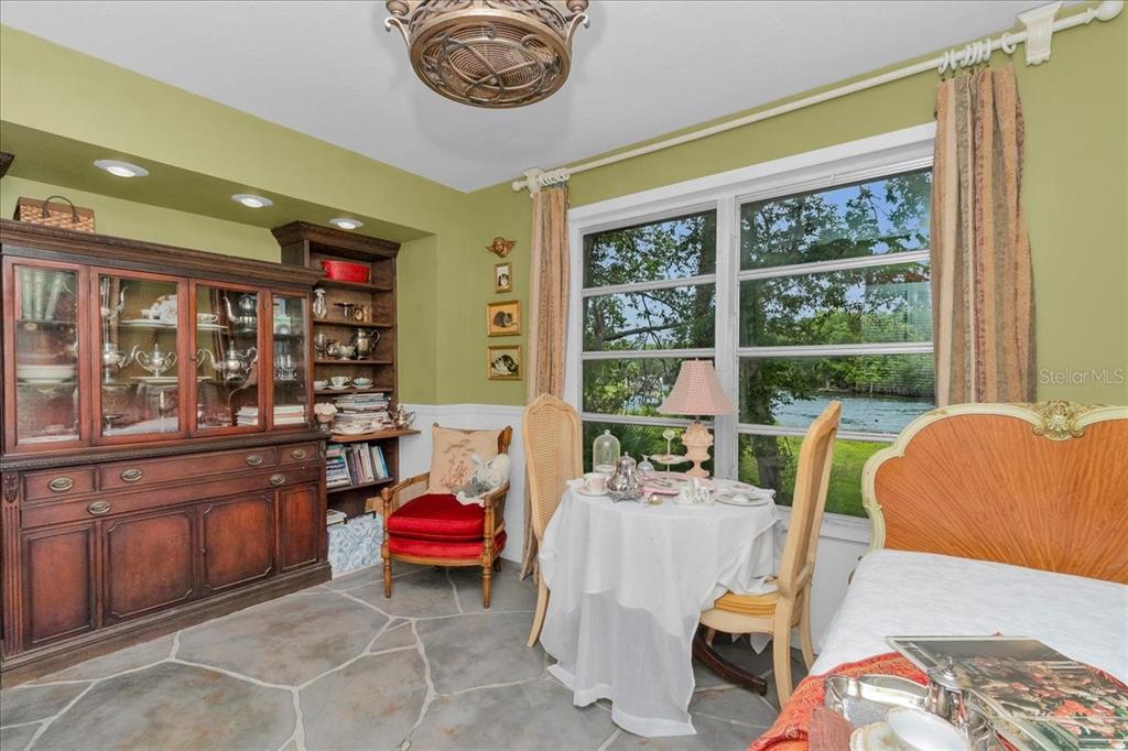 35 Magnolia Avenue Yankeetown, FL 34498 - Photo 24 of 75 a living room with furniture a window and a table