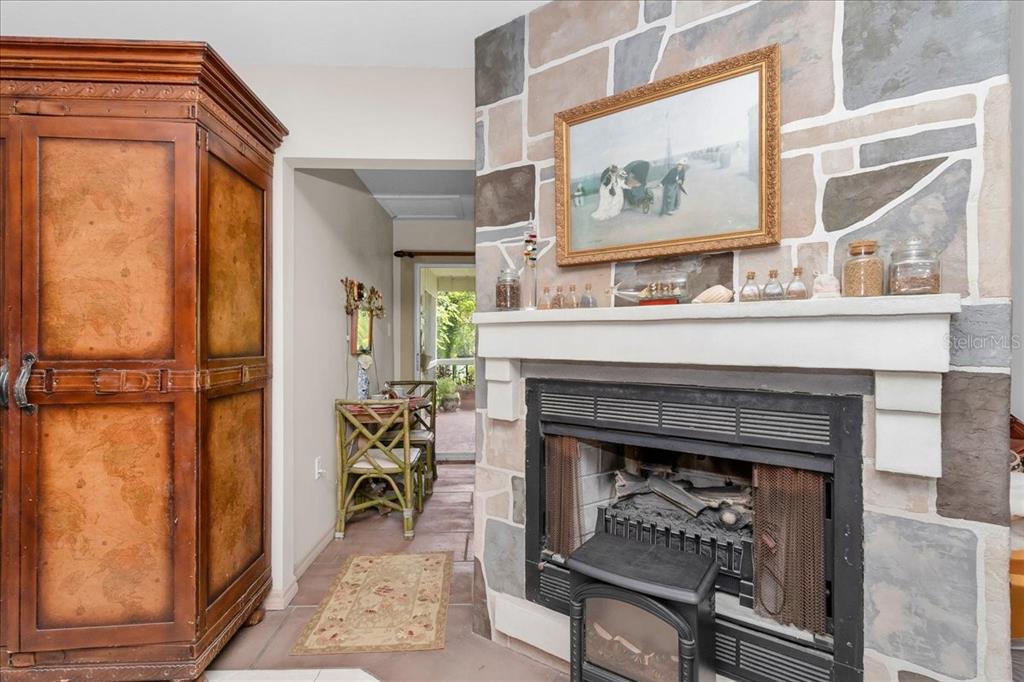 35 Magnolia Avenue Yankeetown, FL 34498 - Photo 33 of 75 a living room with furniture and a fireplace