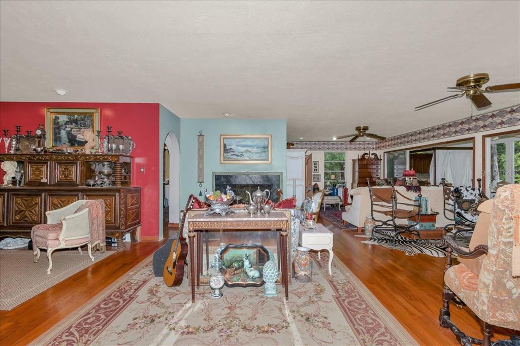 35 Magnolia Avenue Yankeetown, FL 34498 - Photo 36 of 75 a living room with furniture and a fireplace