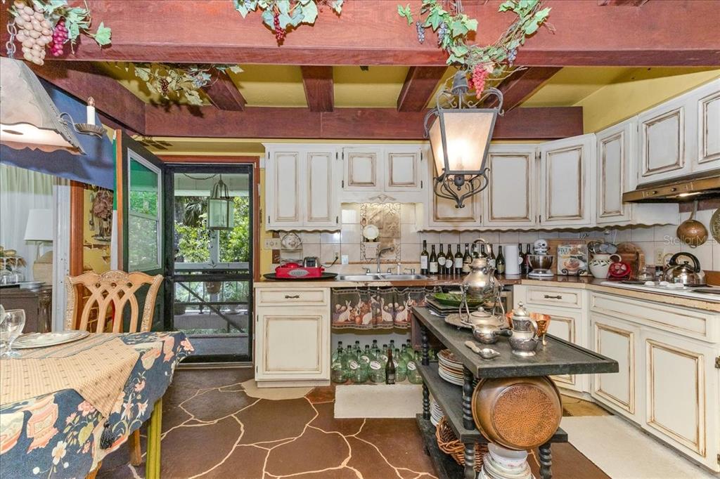 35 Magnolia Avenue Yankeetown, FL 34498 - Photo 38 of 75 a kitchen with a stove a refrigerator and cabinets