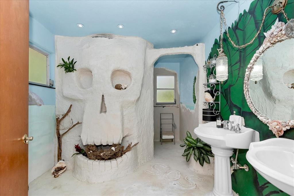 35 Magnolia Avenue Yankeetown, FL 34498 - Photo 50 of 75 a living room with furniture and a chandelier