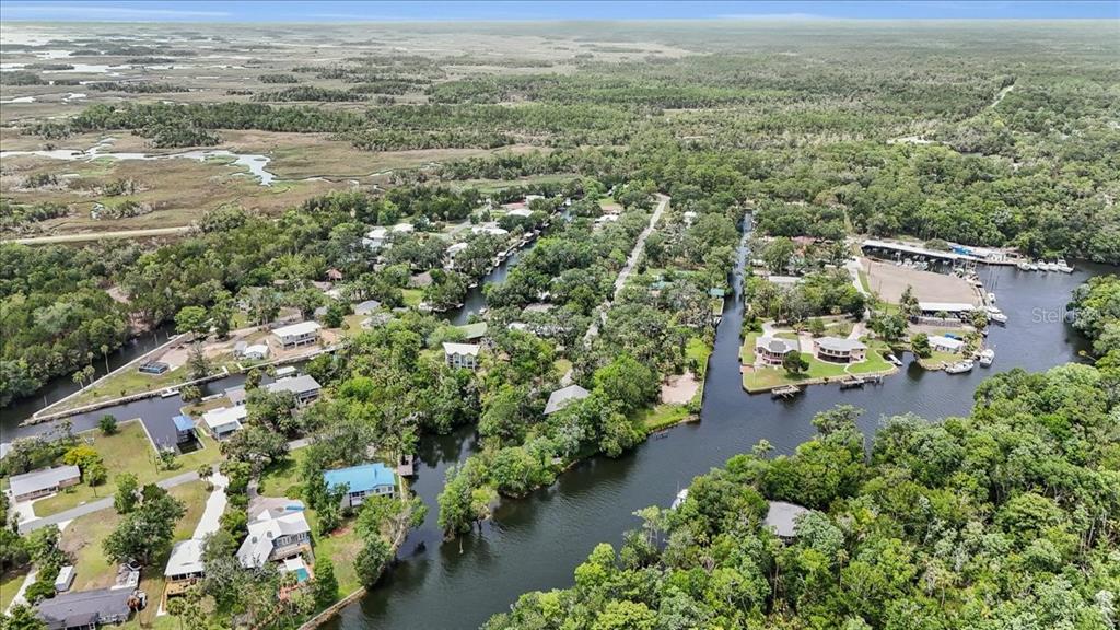 35 Magnolia Avenue Yankeetown, FL 34498 - Photo 57 of 75 an aerial view of a city with lots of residential buildings