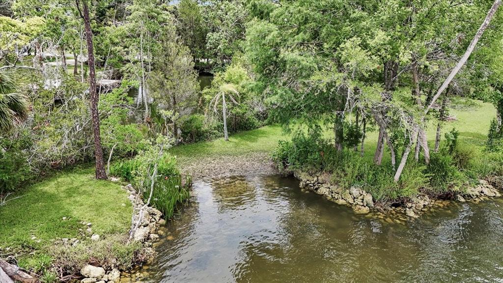 35 Magnolia Avenue Yankeetown, FL 34498 - Photo 62 of 75 a view of a water pond with lots of trees