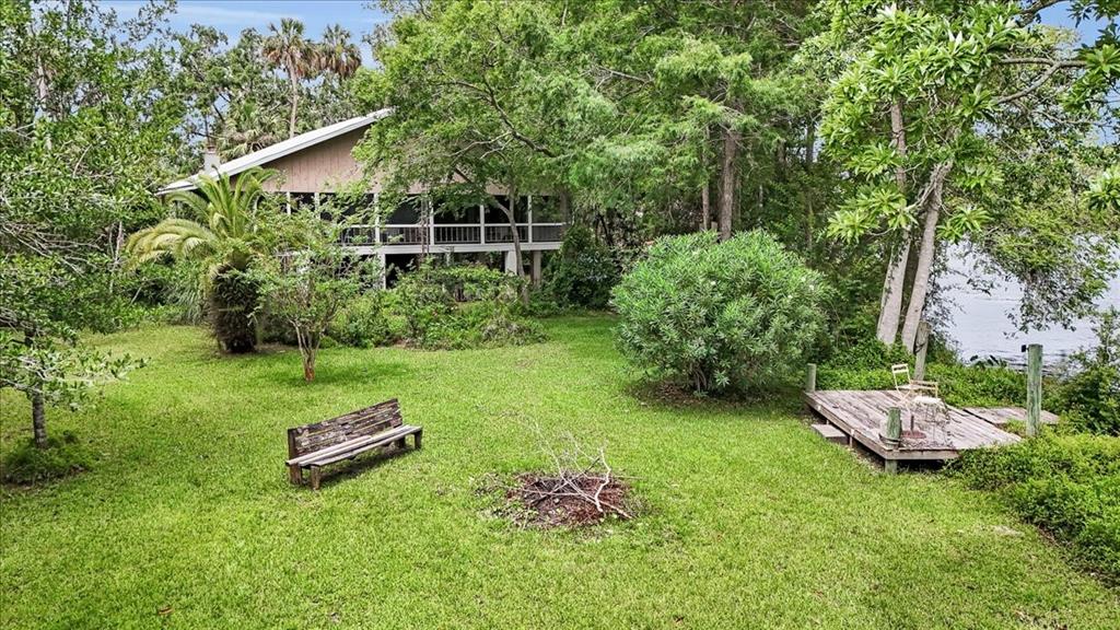 35 Magnolia Avenue Yankeetown, FL 34498 - Photo 65 of 75 a garden view with a sitting space