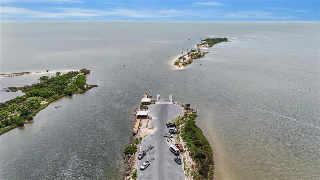 35 Magnolia Avenue Yankeetown, FL 34498 - Photo 69 of 75 an aerial view of a house with a lot of trees all around