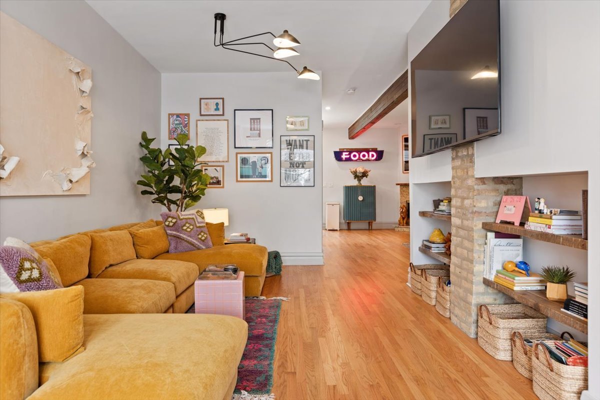 1328 West Byron Street Chicago, IL 60613 - Photo 6 of 40 a living room with furniture and a wooden floor